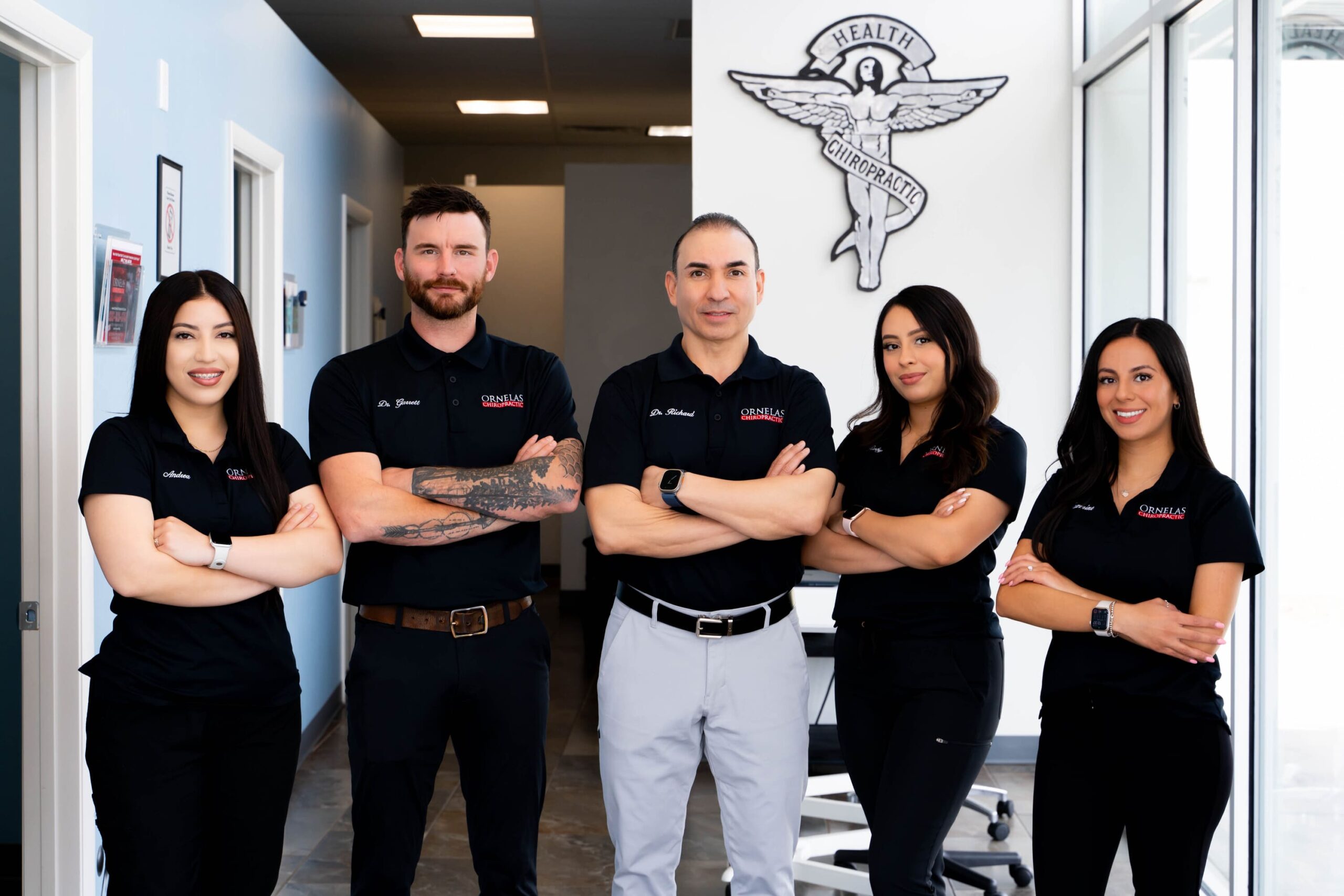A photo of the Ornelas Chiropractic team together in the Tucson office