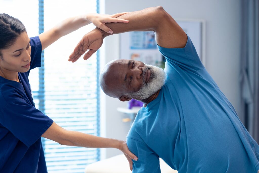 Patient in Tucson practicing stretching techniques as preventive care